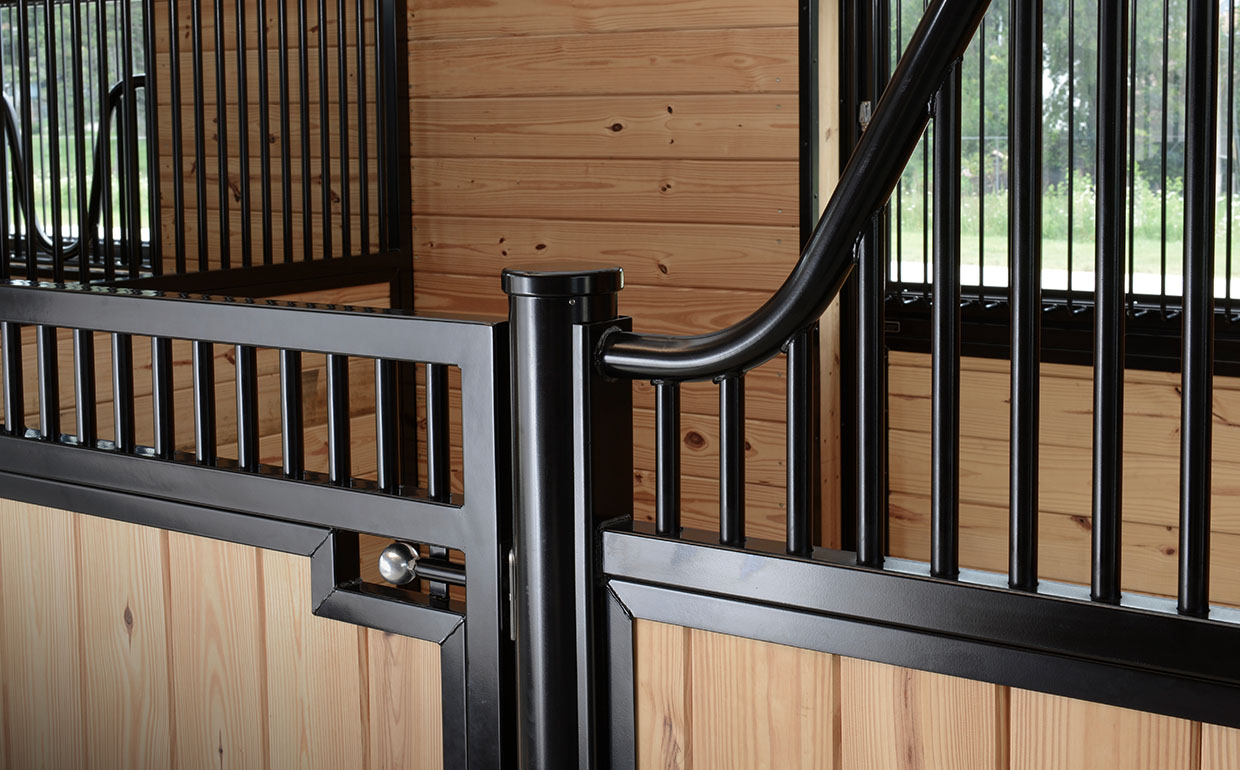 Close up of low euro stall door with plunger latch