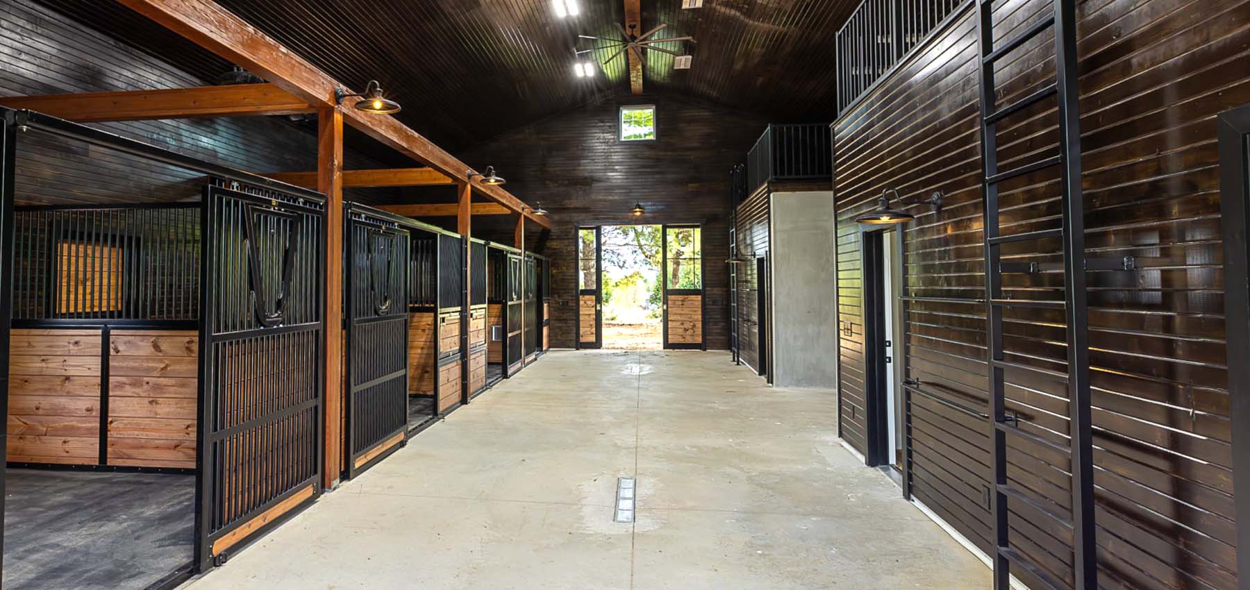 Legend Series sliding-door stall fronts with pull-down yokes