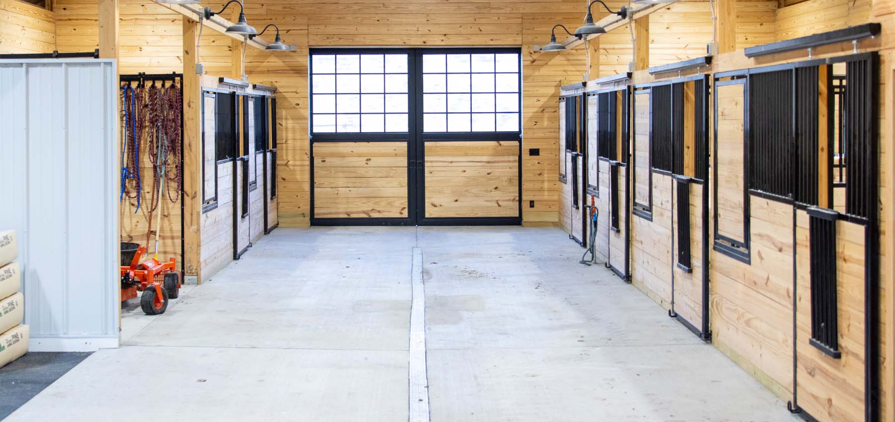 Integrity Series sliding-door stall front component kits with fold-down yokes