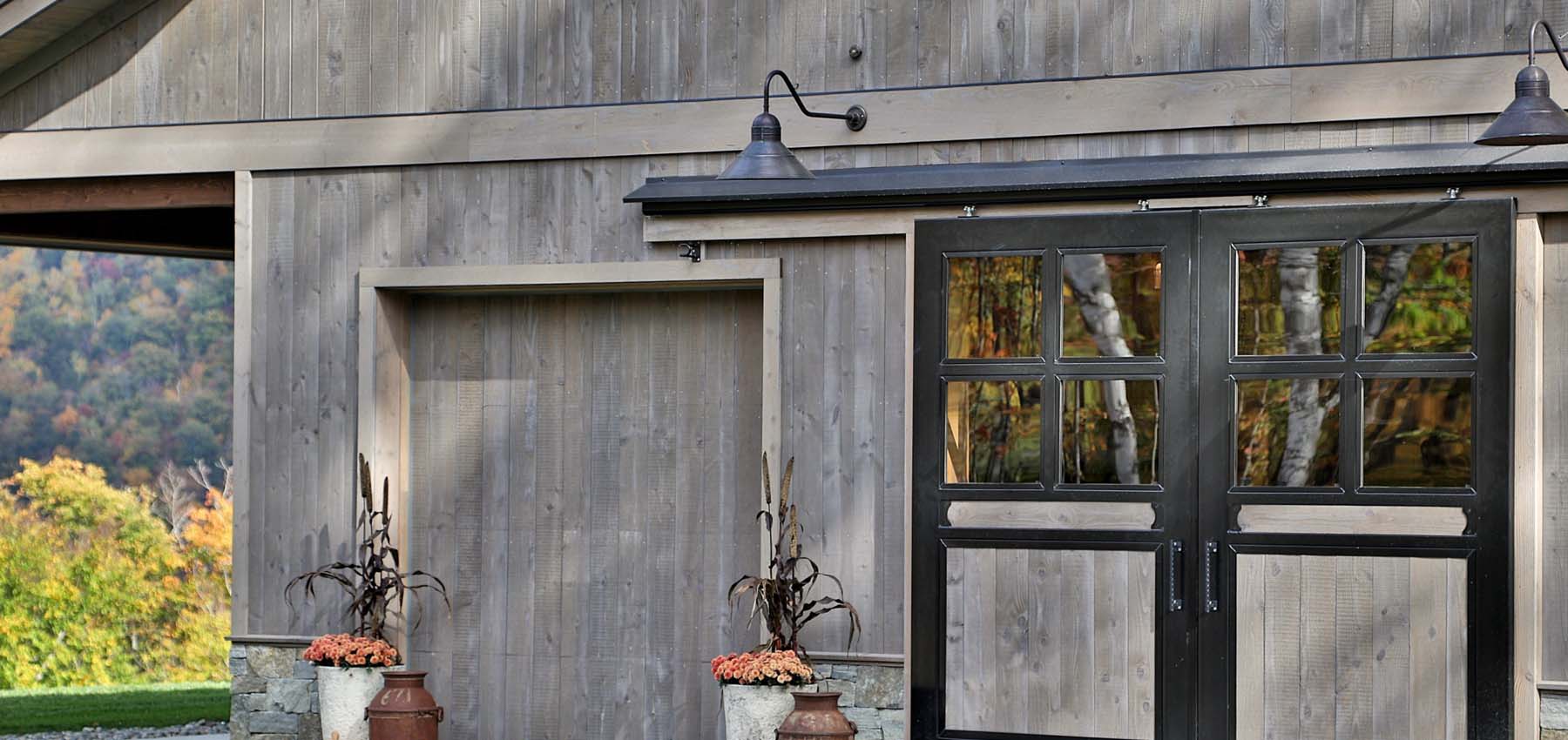Framed glass barn end doors on private barn