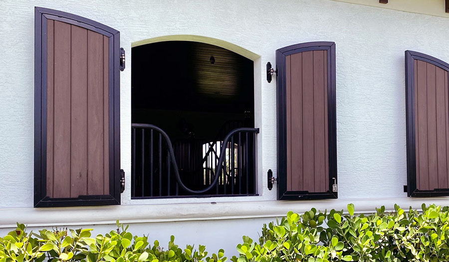 Style W001 - Arched top shutters with standard low-rise window yoke