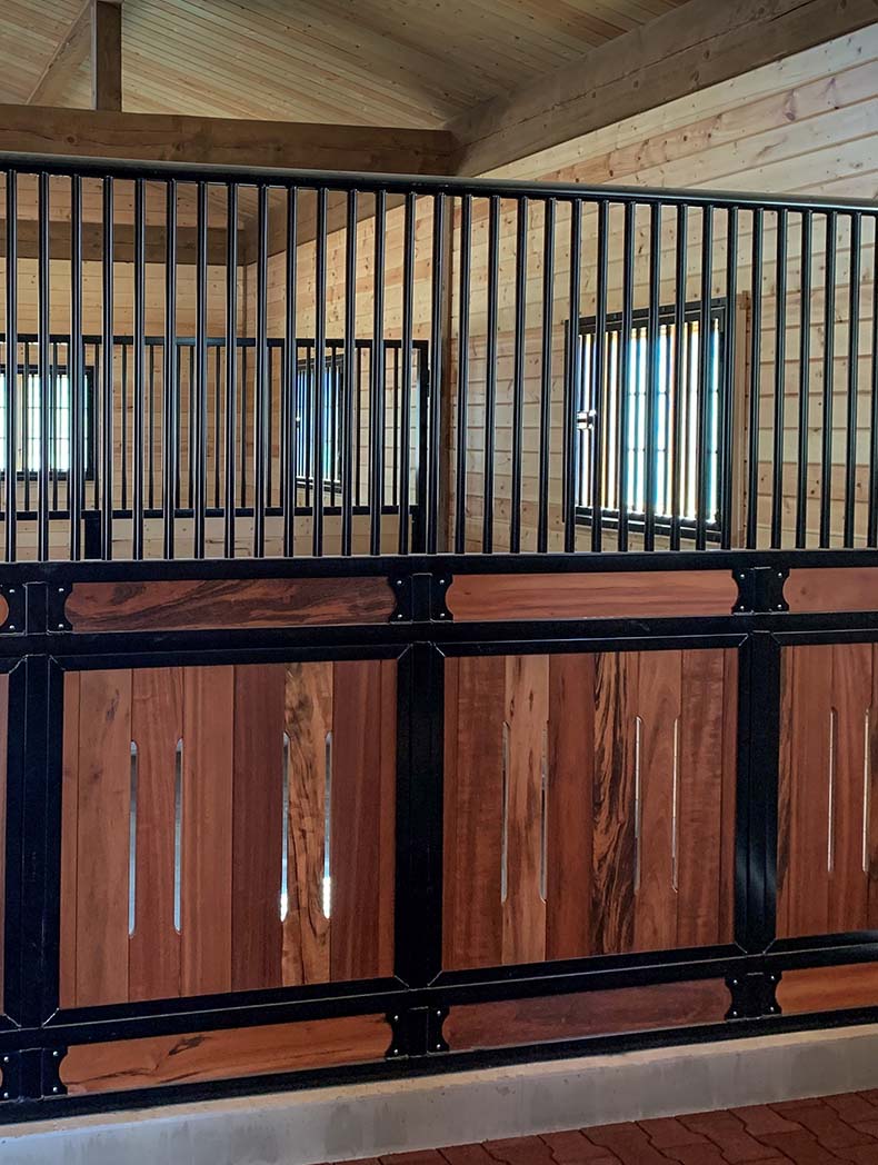 Stall partitions with vented wood fills