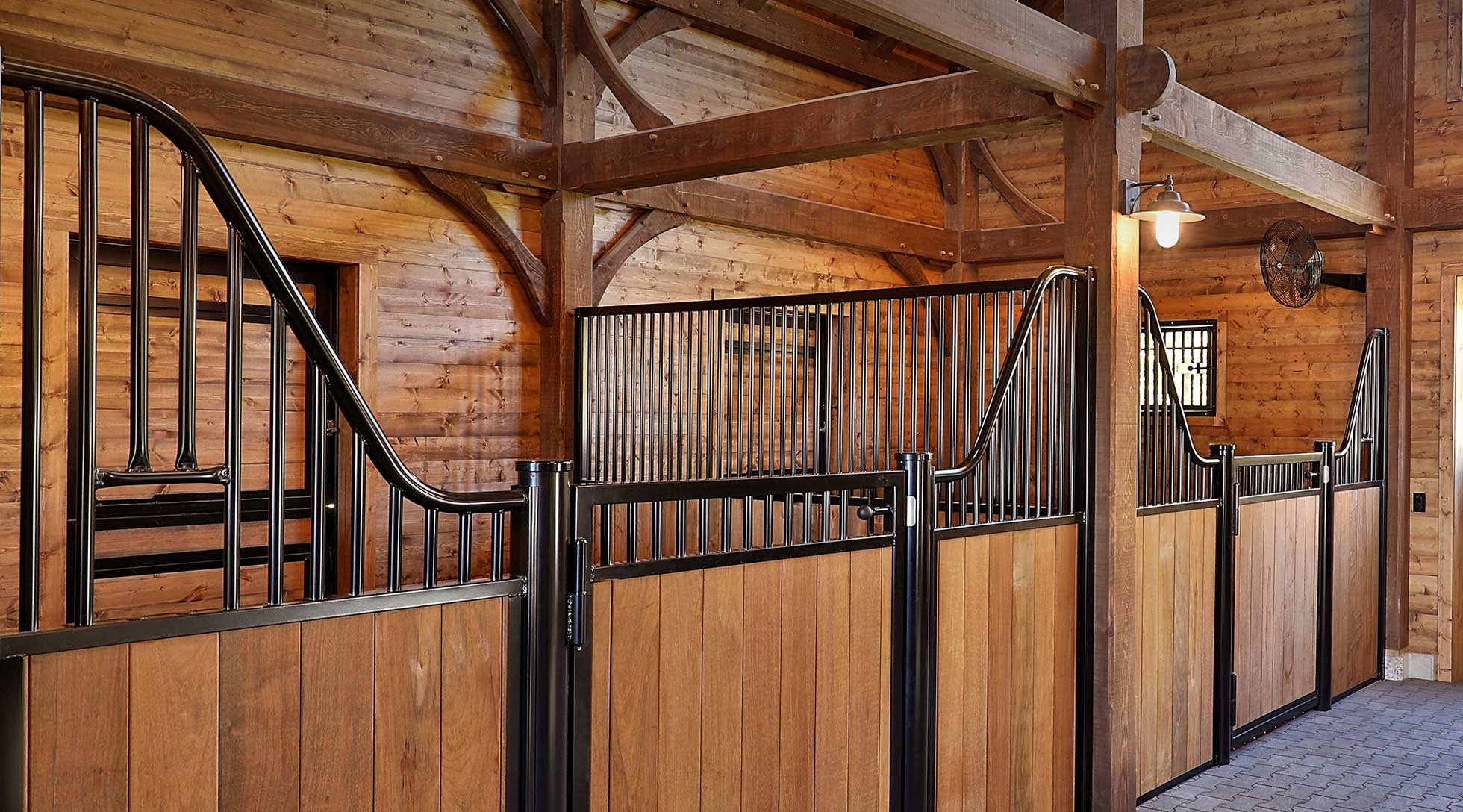 European-style hinged horse stalls
