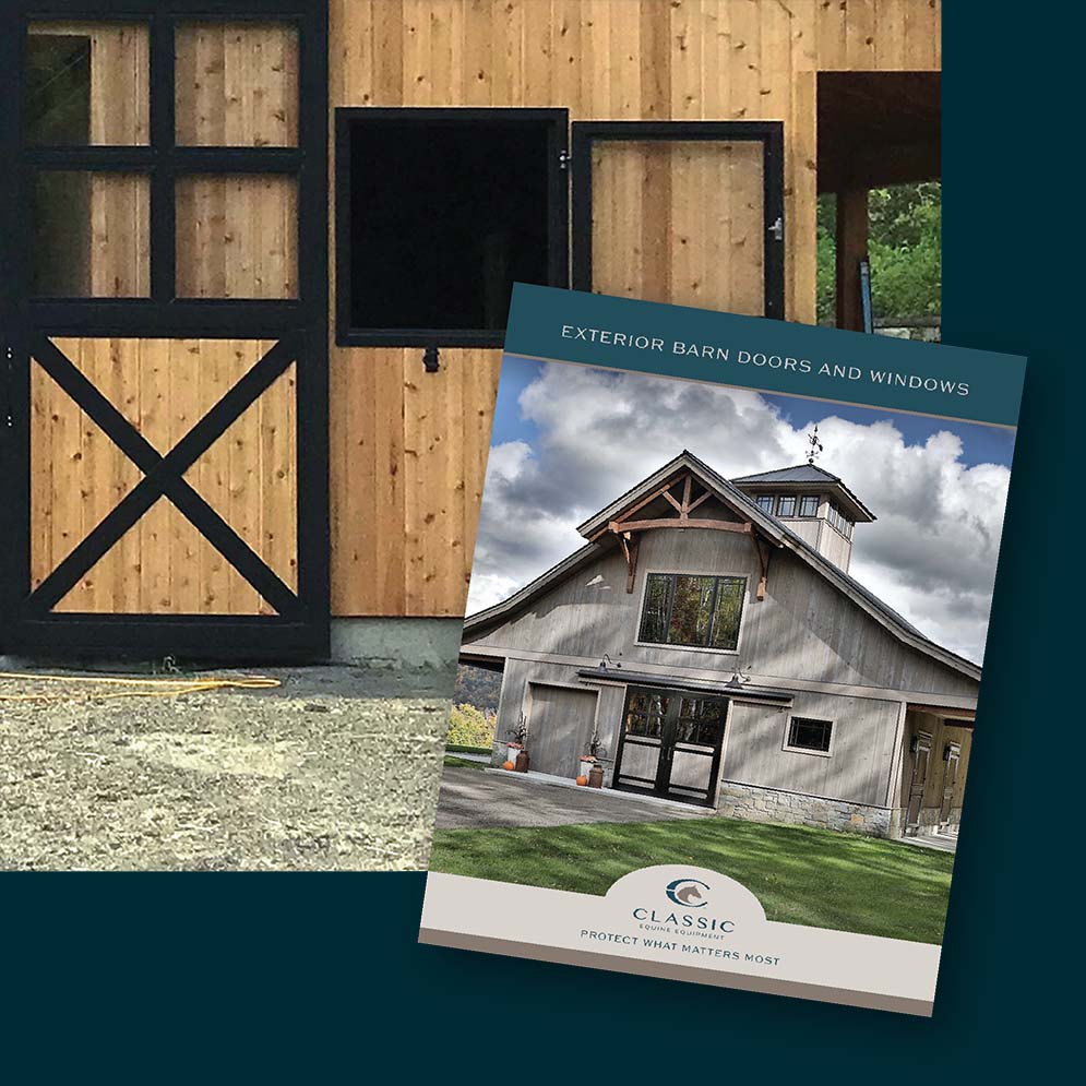 Close up exterior barn door and hinged window wiht brochure cover