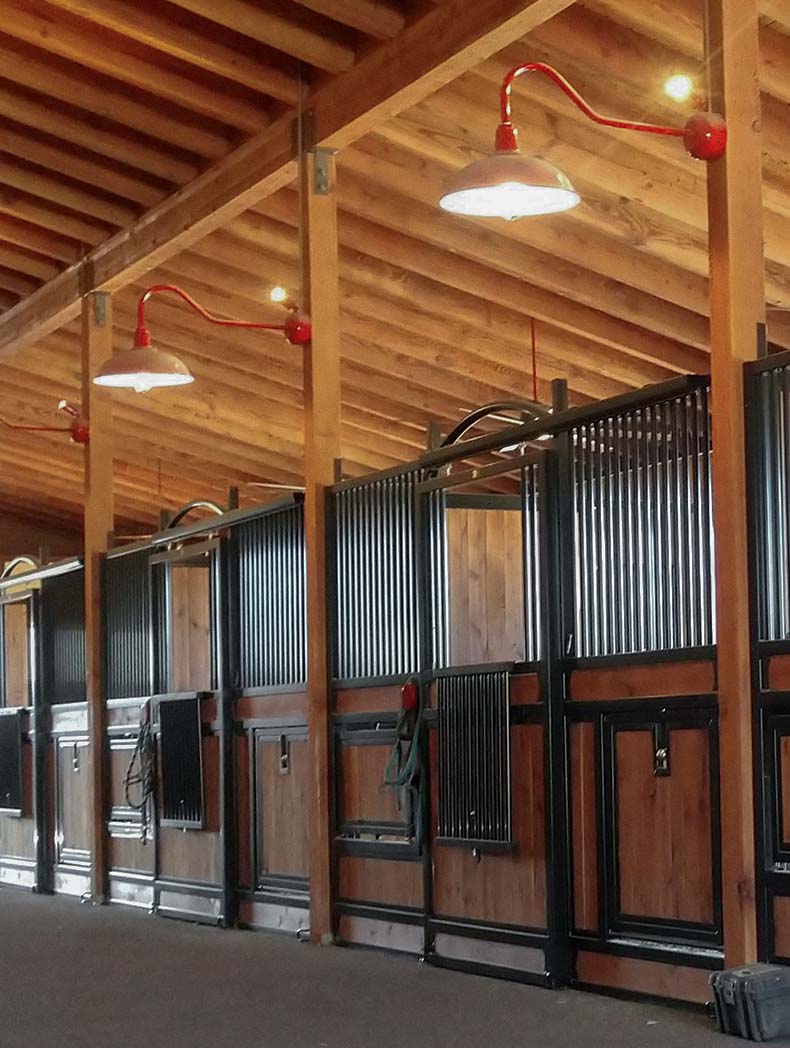 Gooseneck barn lighting top inside the barn.