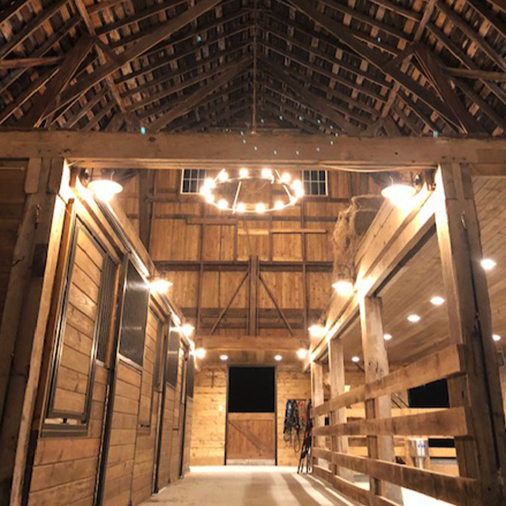 Dawn and Brian Tanner barn. Sliding horse stall fronts with swivel door feeders