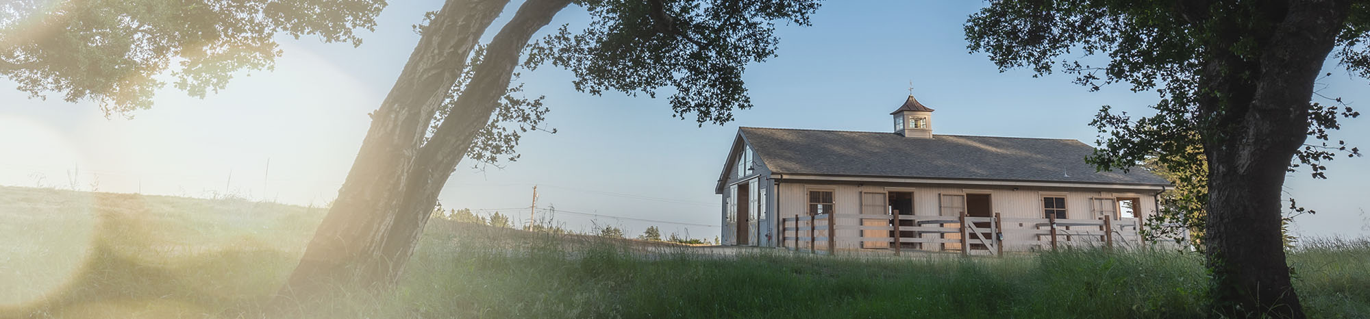 Exterior of horse barn in Santa Cruz with Dutch doors